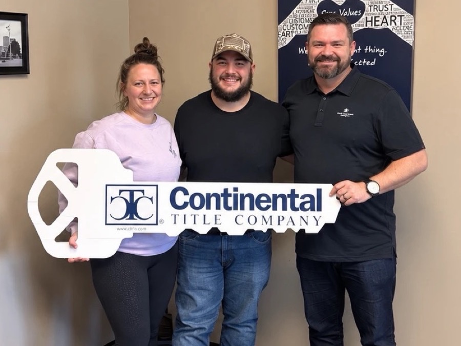 Jordan and Megan on closing day, Shawnee, KS, with Luke Wright