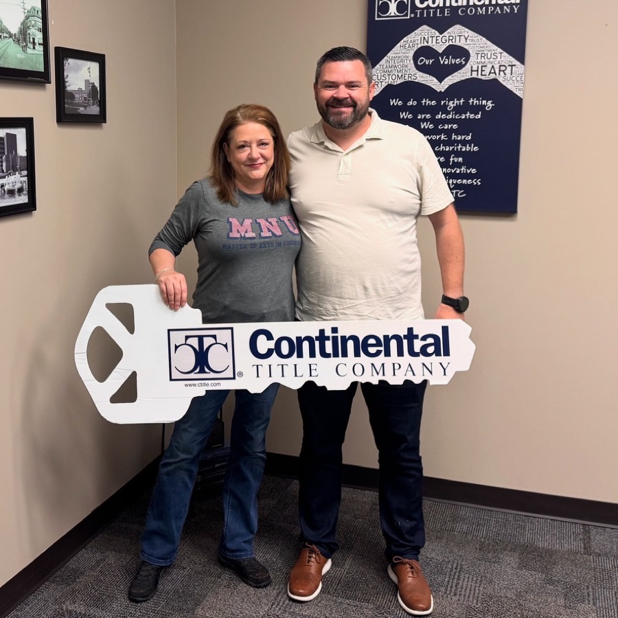Mandy on closing day, Olathe, KS, with Luke Wright